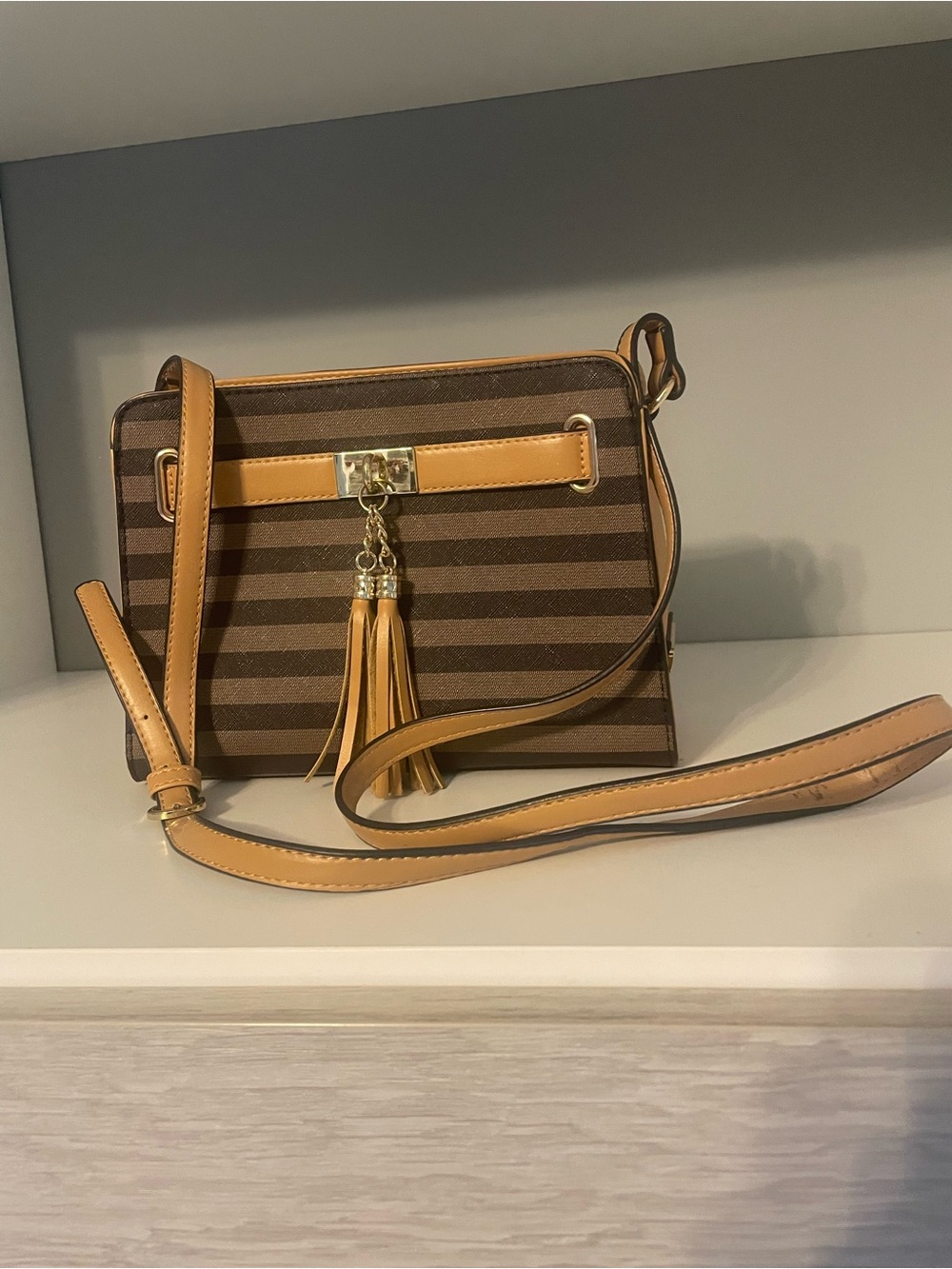 Brown Striped Crossbody Bag with Tan Trim and Tassel